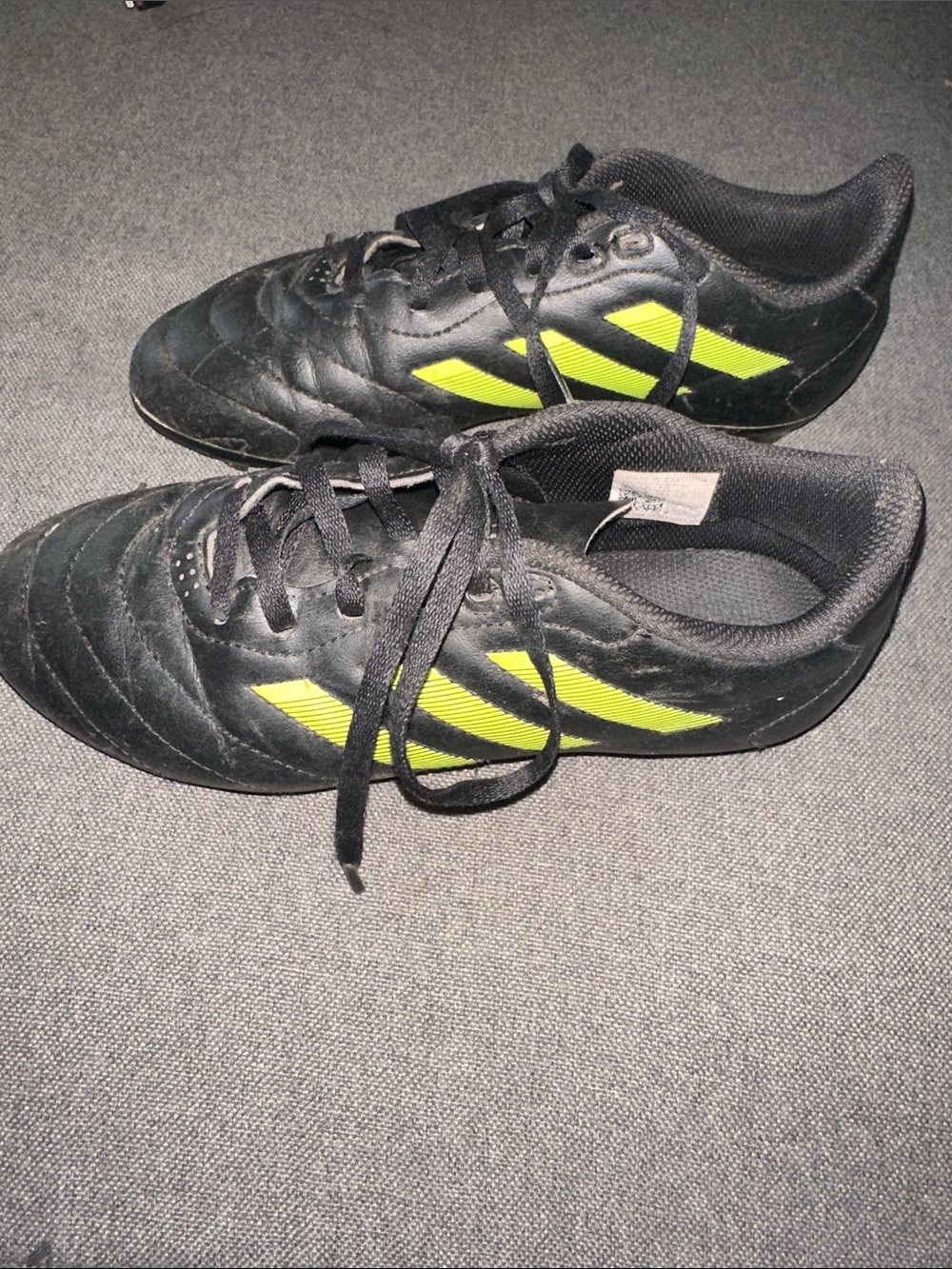 adidas Black Soccer Cleats with Neon Yellow Stripes